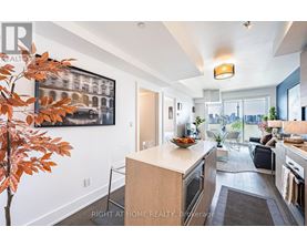 A modern kitchen with a dining table and chairs.