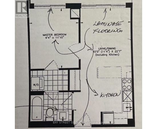 A floor plan for a master bedroom and living/dining area with laminate flooring.