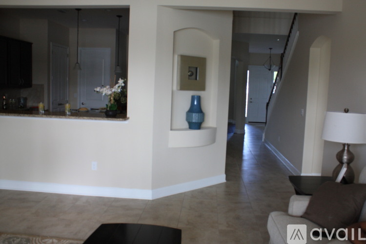 A living room with a couch and a coffee table.