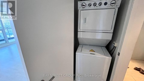 A white dishwasher is installed in a kitchen.