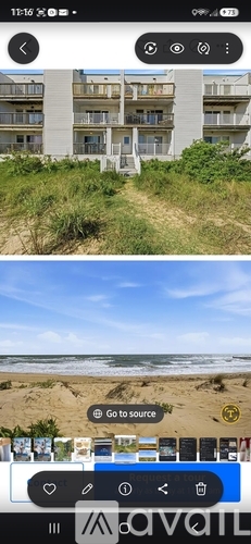 A beachfront apartment building with a staircase leading to the entrance.