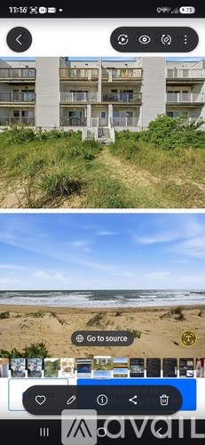 A beachfront apartment building with a staircase leading to the entrance.