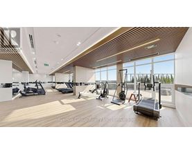 A gym with treadmills, elliptical machines, and other exercise equipment.