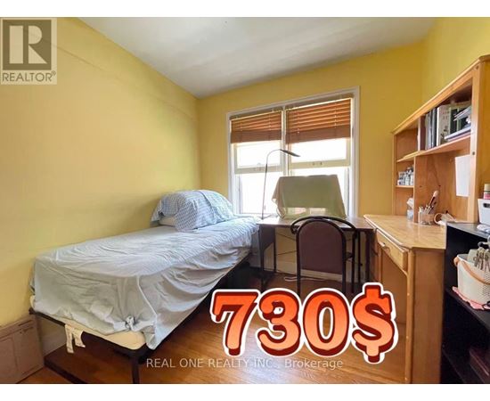A bedroom with a bed, chair, and desk is on sale for 730$.