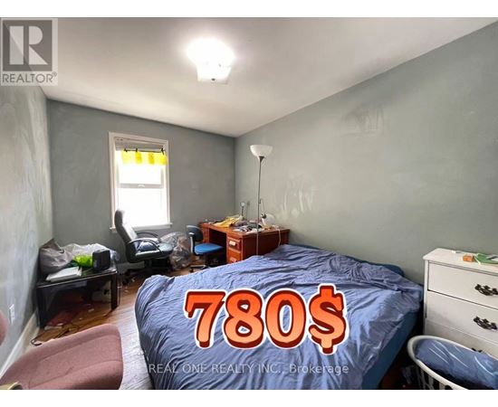 A bedroom with a bed covered in a 780$ bedsheet.