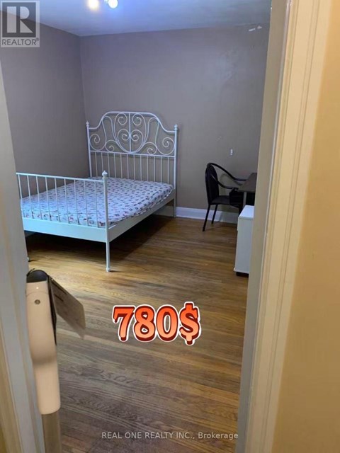 A bedroom with a bed, chair, and a price tag of 780$.