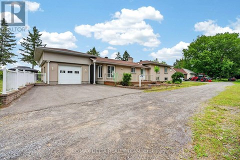 A house with a driveway in front of it.