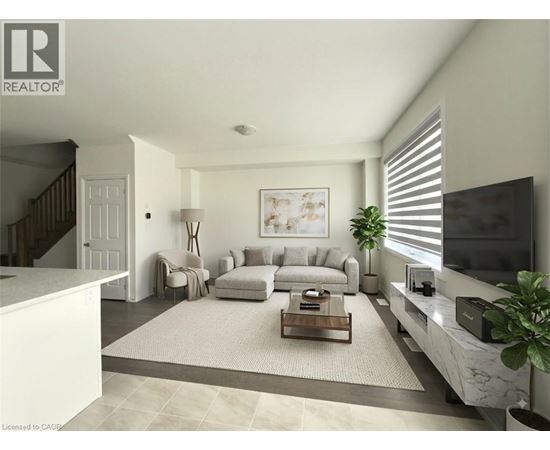 A living room with a white sofa set and a coffee table.