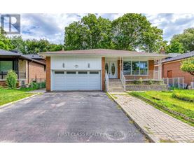A house with a white garage door is for sale.