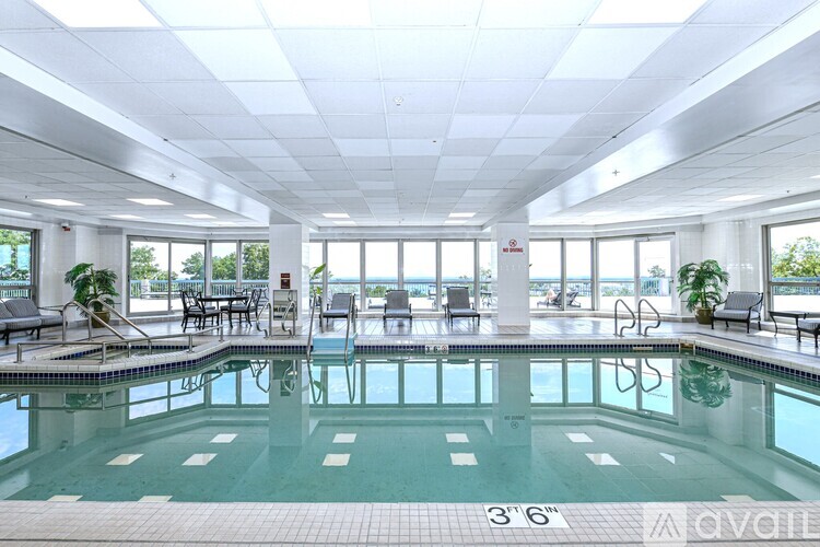 A large indoor swimming pool with a 3'6" depth marker.