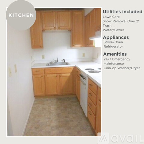 A kitchen with wooden cabinets and a white countertop.