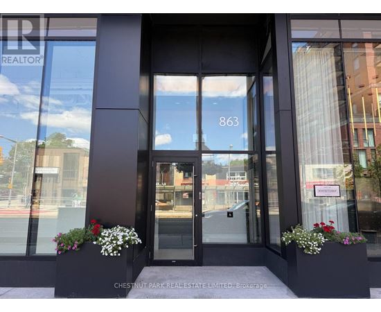 The front of a building with the number 863 on it.