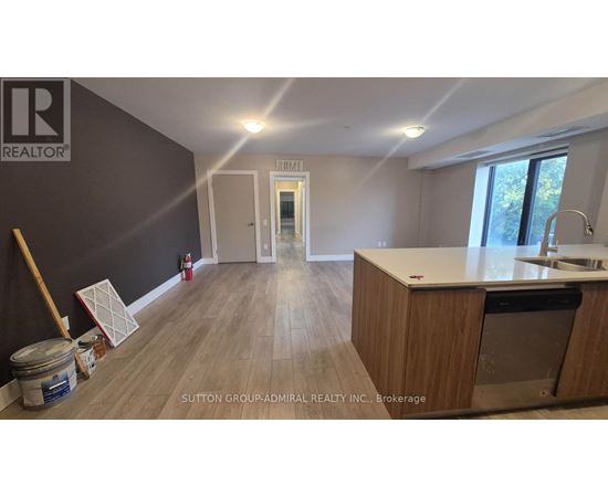 A kitchen with a countertop and cabinets is under construction.
