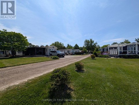 A brokerage company is advertising their services in a residential area.
