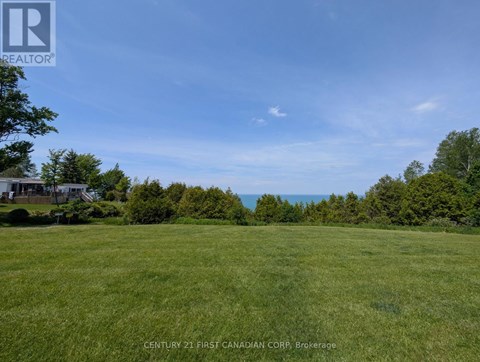 A brokerage sign is in the upper left corner of this image.