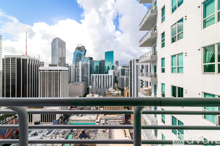 A cityscape with a mix of modern and older buildings.