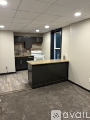A reception area with a desk and a window.