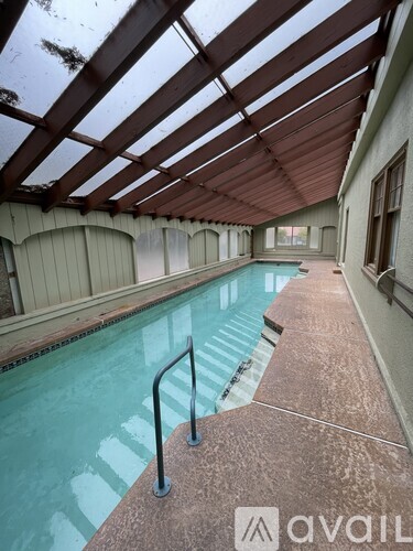 A pool inside a building with Avail written on the bottom right.