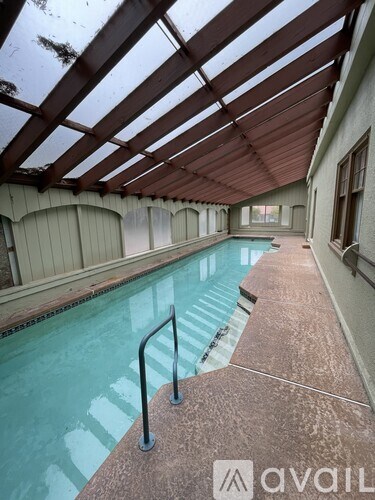 A pool inside a building with Avail written on the bottom right.