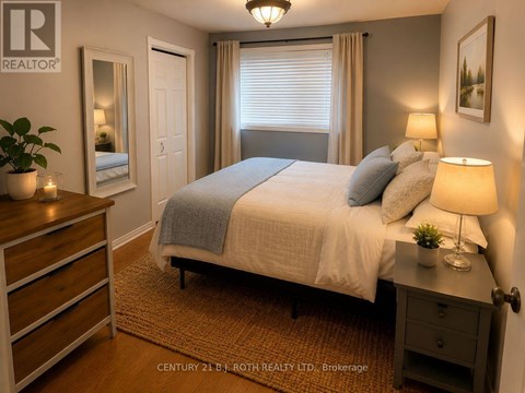 A bedroom with a bed, nightstand, and dresser.