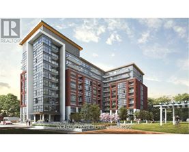A modern multi-story building with a glass facade and a red brick exterior.