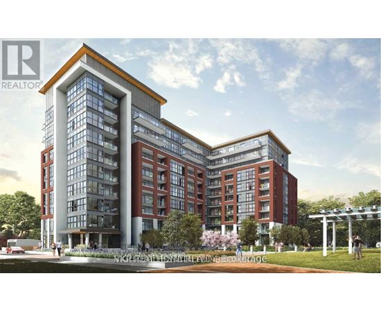 A modern multi-story building with a glass facade and a red brick exterior.