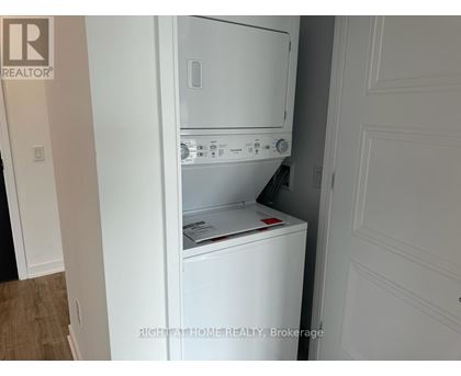 A white dishwasher is installed in a kitchen.