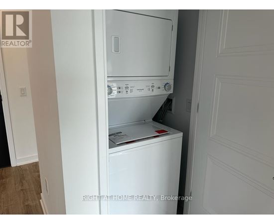 A white dishwasher is installed in a kitchen.
