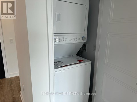 A white dishwasher is installed in a kitchen.