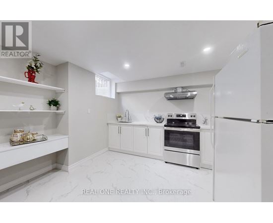 A white kitchen with a refrigerator, oven, and shelves.