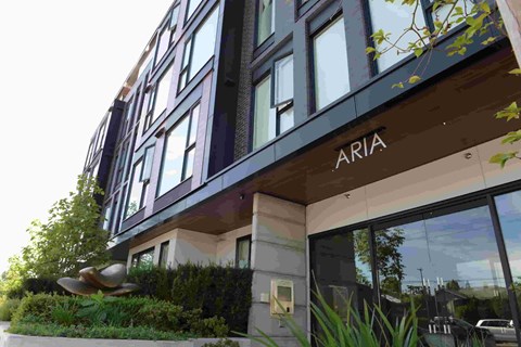 A modern building with the name ARIA on the front.