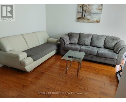 Two couches and a coffee table in a room.