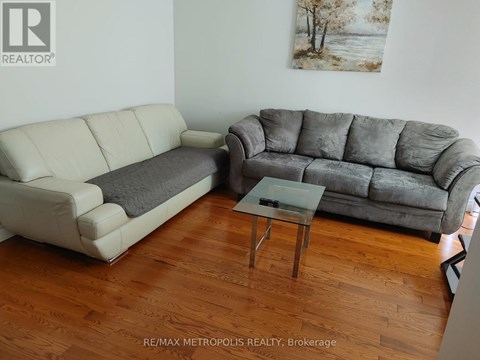 Two couches and a coffee table in a room.