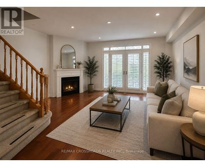 A living room with a fireplace and a couch.
