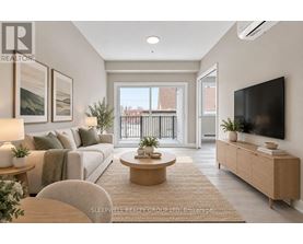 A well-lit, modern living room with a large window and a flat-screen TV.