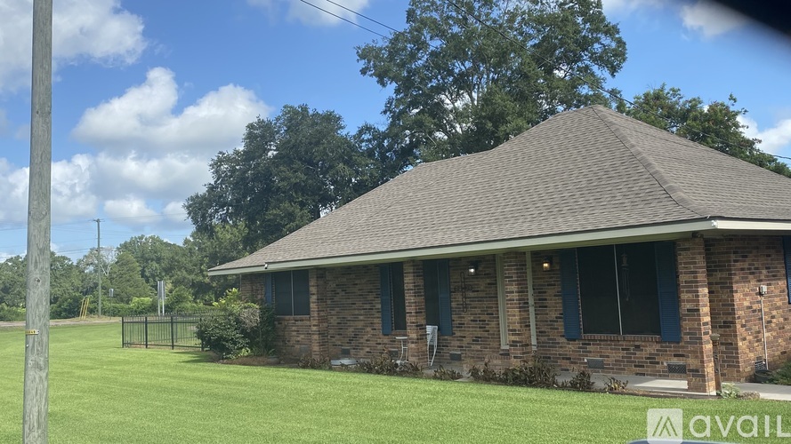 A house with a sign that says "available" in front of it.