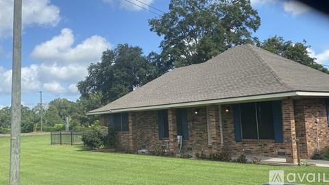 A house with a sign that says "available" in front of it.