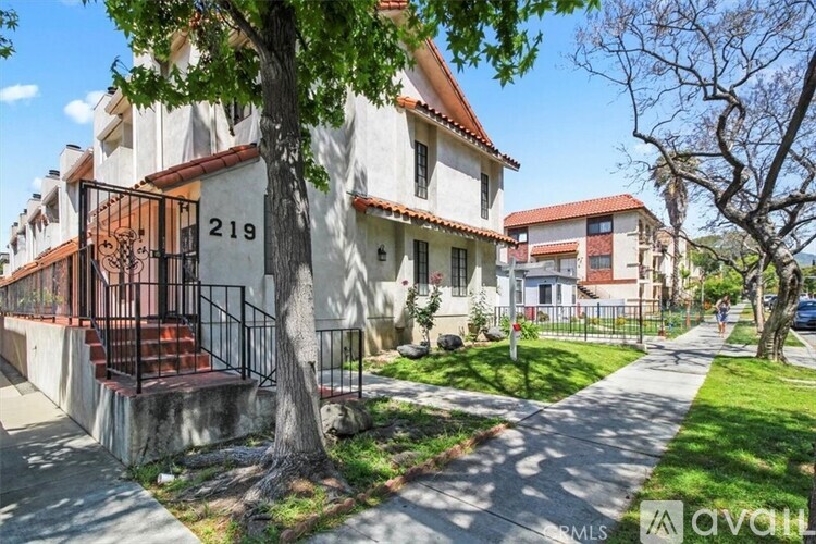 A house numbered 219 is for sale.
