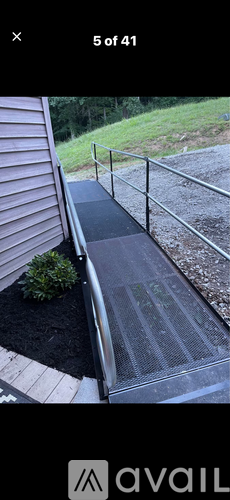 A close-up view of a metal railing on a staircase.