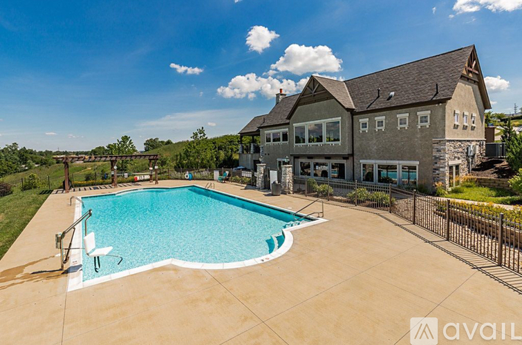 A house with a pool in the backyard.
