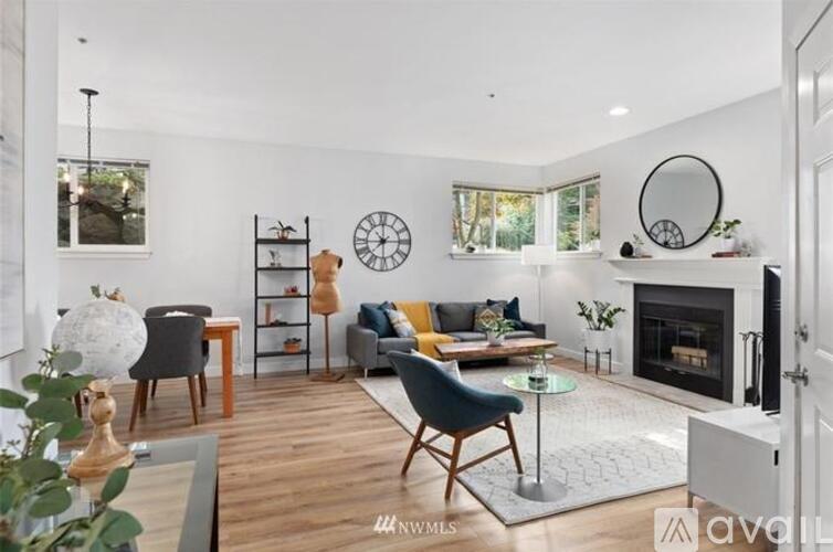 A living room with a fireplace and a couch.