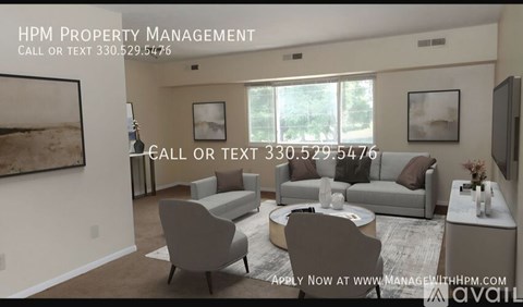 A living room with a couch, chairs, and a coffee table is shown with an advertisement for HPM Property Management.
