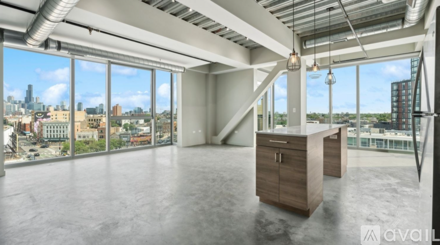 A spacious office with a view of the city skyline.