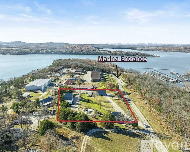An aerial view of a property with a red outline indicating the Marina Entrance.