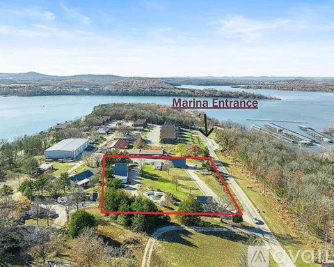 An aerial view of a property with a red outline indicating the Marina Entrance.