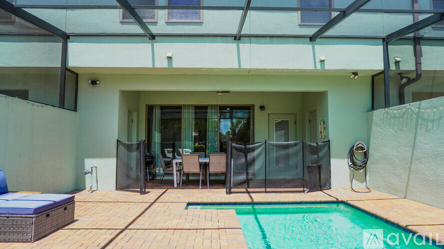 A modern house with a pool in the backyard.