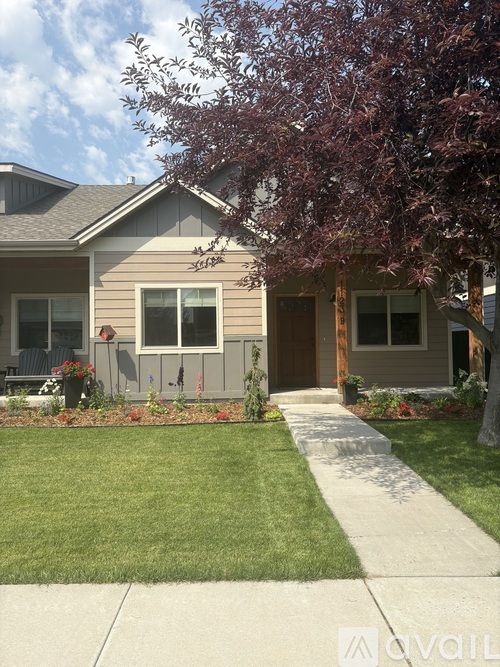A house with a brown door and a brown window.