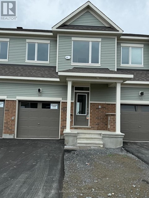 A two-story house with a garage on the first floor.