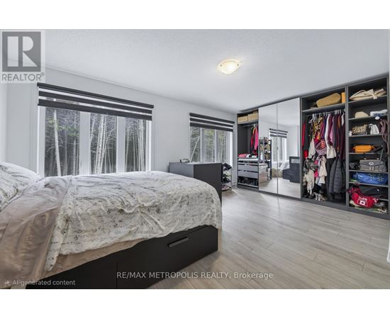 A bedroom with a large bed and a closet full of clothes.