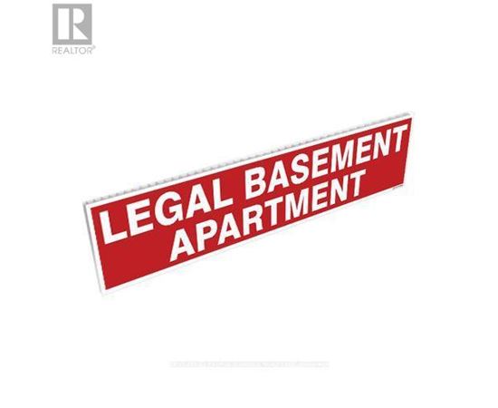 A red sign that says Legal Basement Apartment.